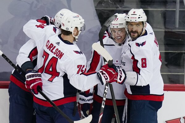 Great 8 Ovechkin scores historic PP goal Caps sweep Devils AP News